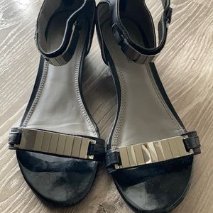 Black sandals with small wedge and ankle strap